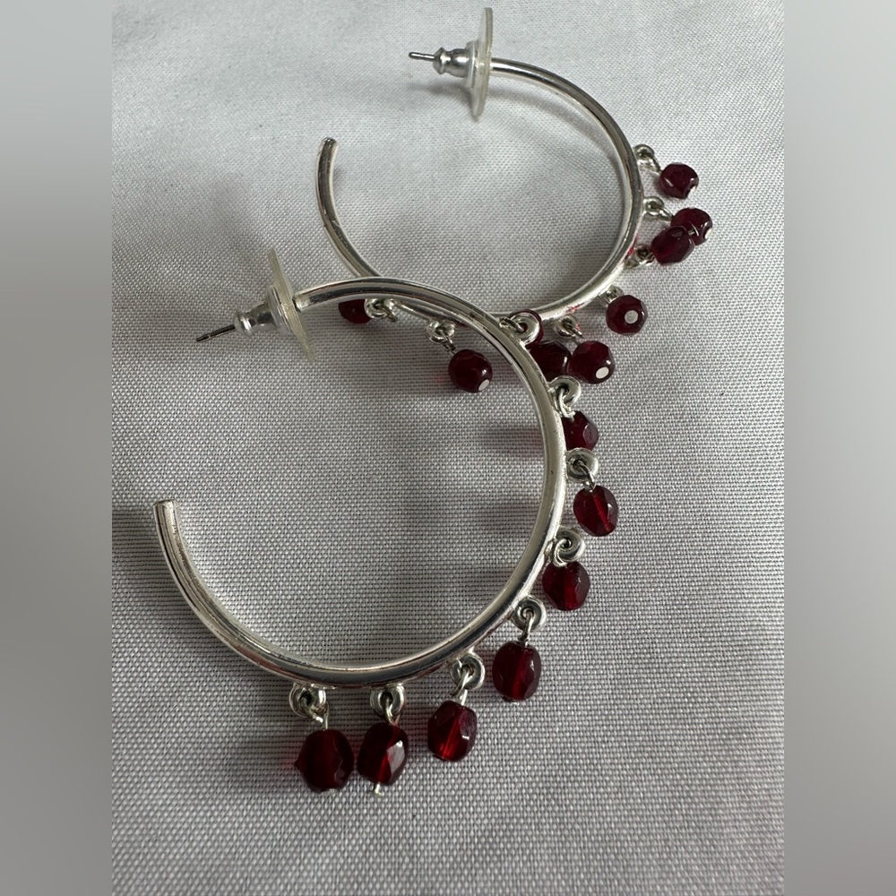 Silvertone hoops with tiny red glass bead dangles